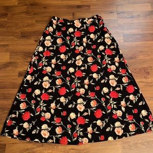 NWOT Black skirt with red and pink floral design